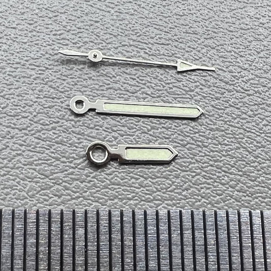 Set of 2 silver-trimmed 15mm green lume watch hands for Miyota 2035, 2115, 2105, 2305 movements.