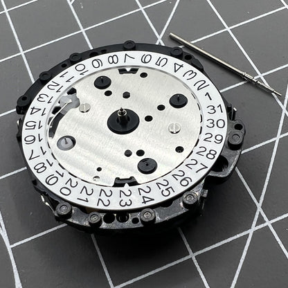 Japan Made Hattori Epson TMI VD53 quartz watch movement with date display at 3, 6, and 4:30 positions.