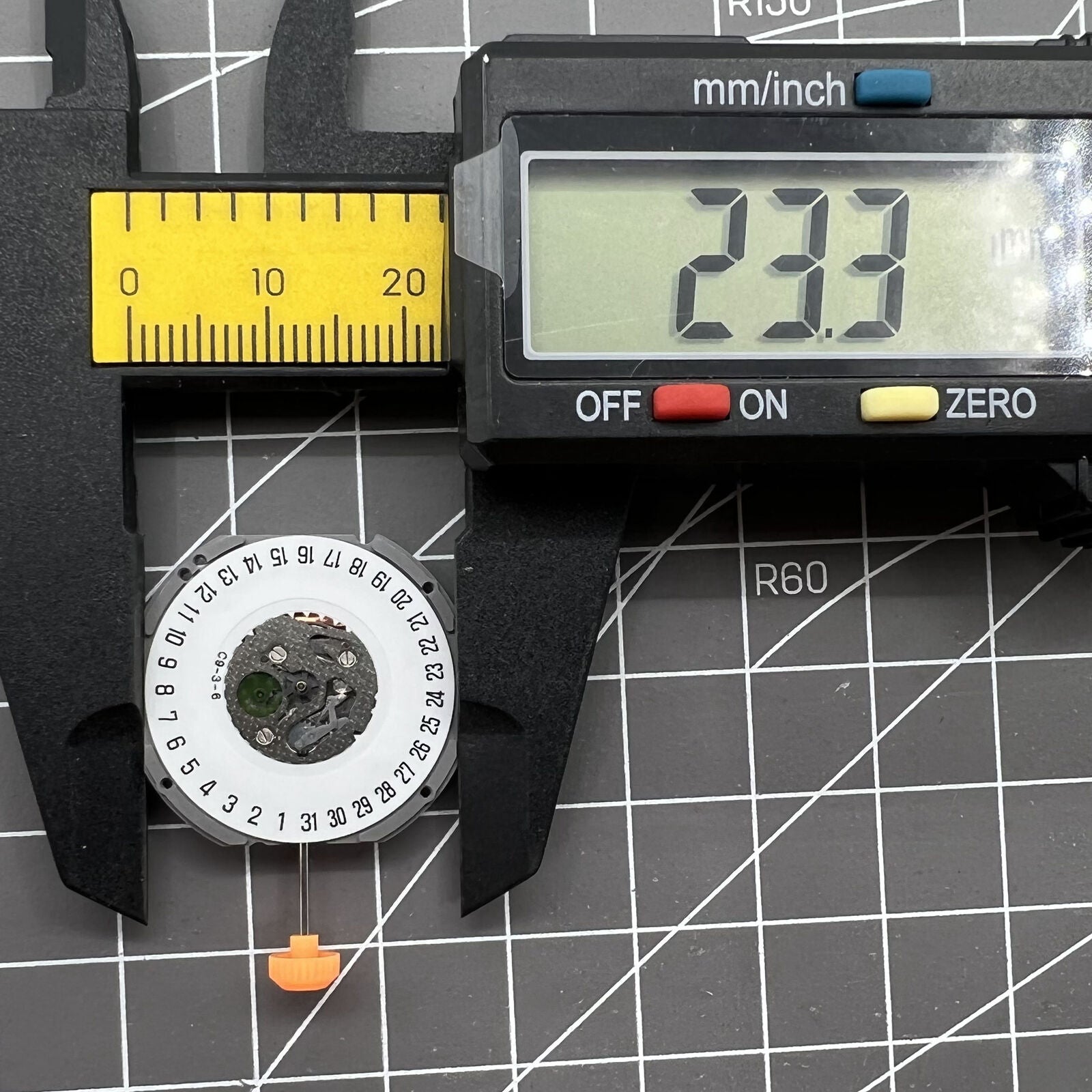 Japan Made Miyota 1S13 quartz watch movement with date display at 6 o'clock for precise timekeeping.
