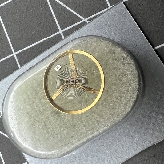 Swiss Balance Wheel for ETA C01.211 movement, precision watch part #6402 by Swiss Balance Wheel, ensuring accurate timekeeping.