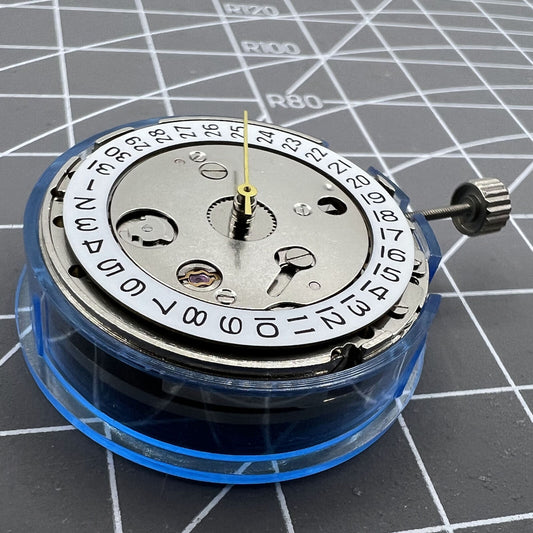 ST1612 mechanical automatic watch movement showcasing calendar display and precision gears.