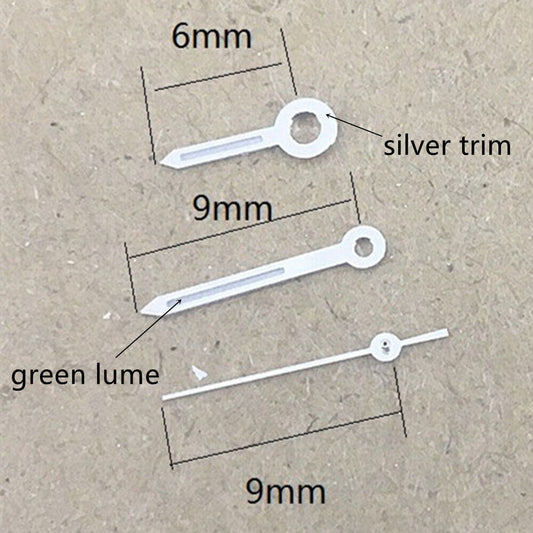 9mm silver-trimmed green lume watch hands for Miyota 1M12 movement, precise replacement parts.
