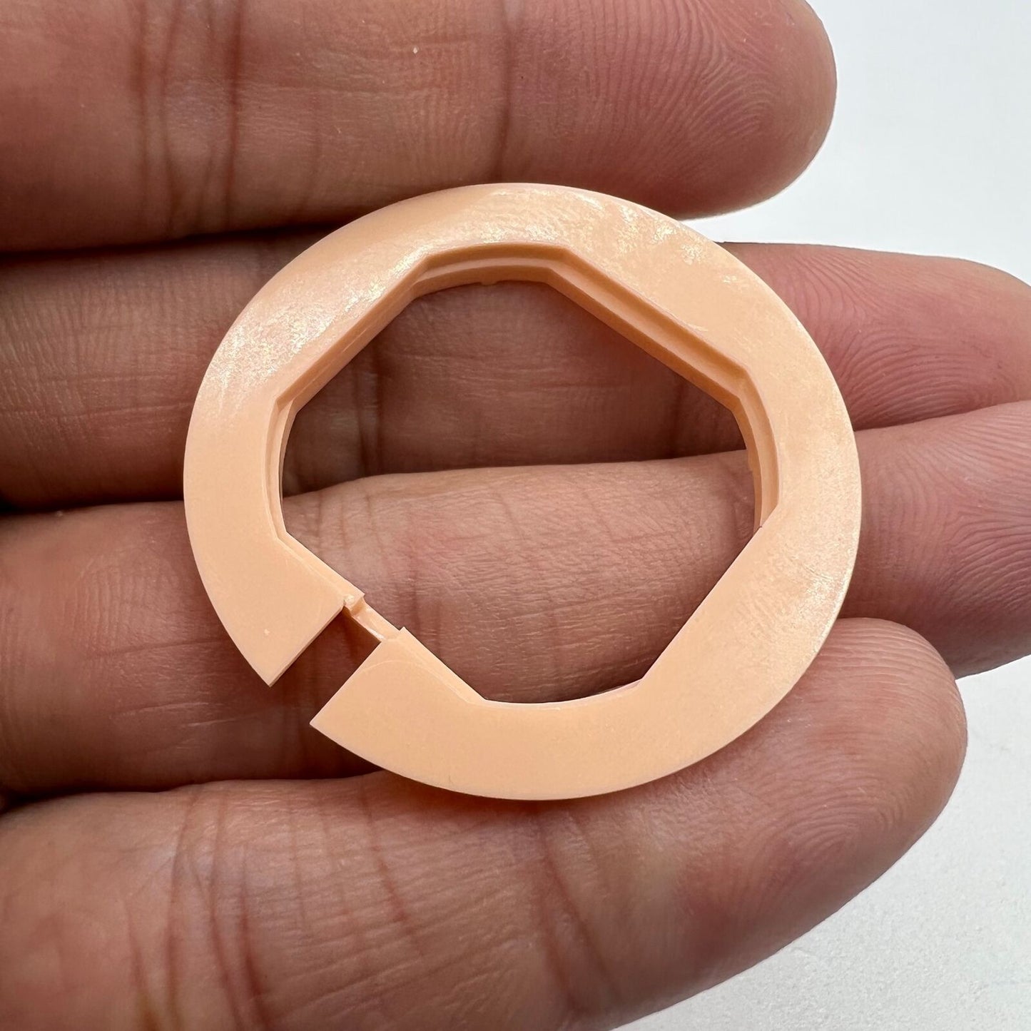 Durable watch case cushion mount spacer ring for HTR VX42/VX43 movement repair accessory.