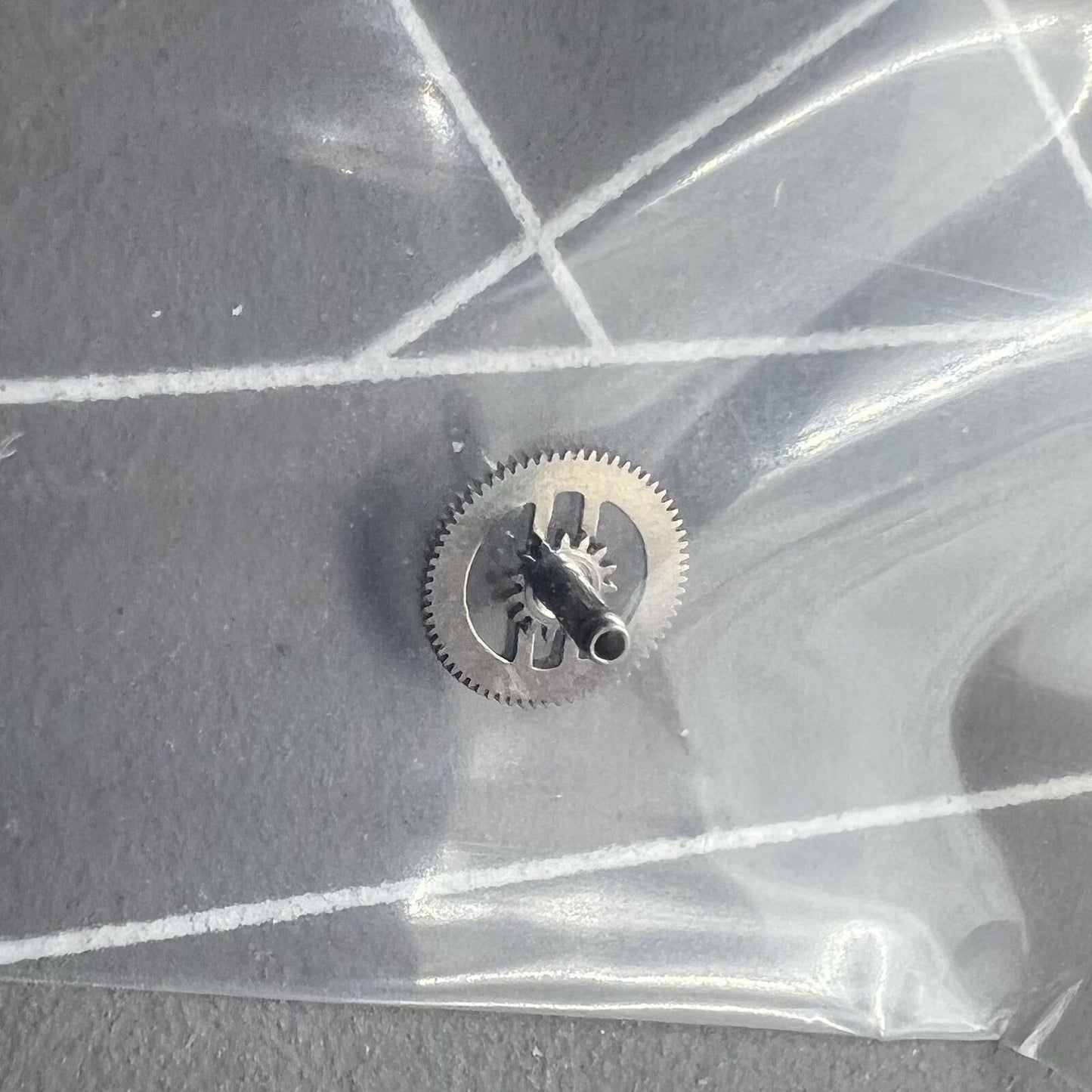 Cannon pinion with driving wheel for ETA 2671 2775 movement, precision watch accessory.