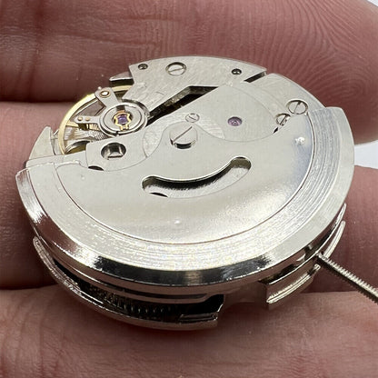 Dandong 7120 automatic watch with single calendar at 3 o'clock, sleek design, China made craftsmanship.