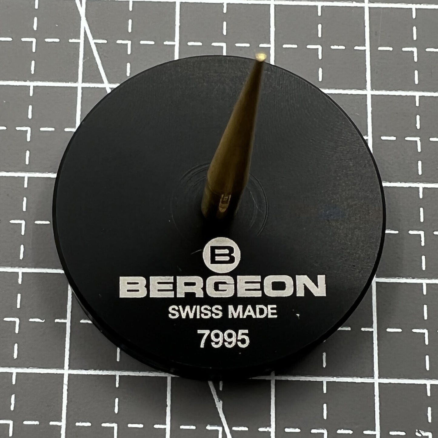 Swiss Bergeon 7995 balance cock support tool for precise watch repair and assembly tasks.