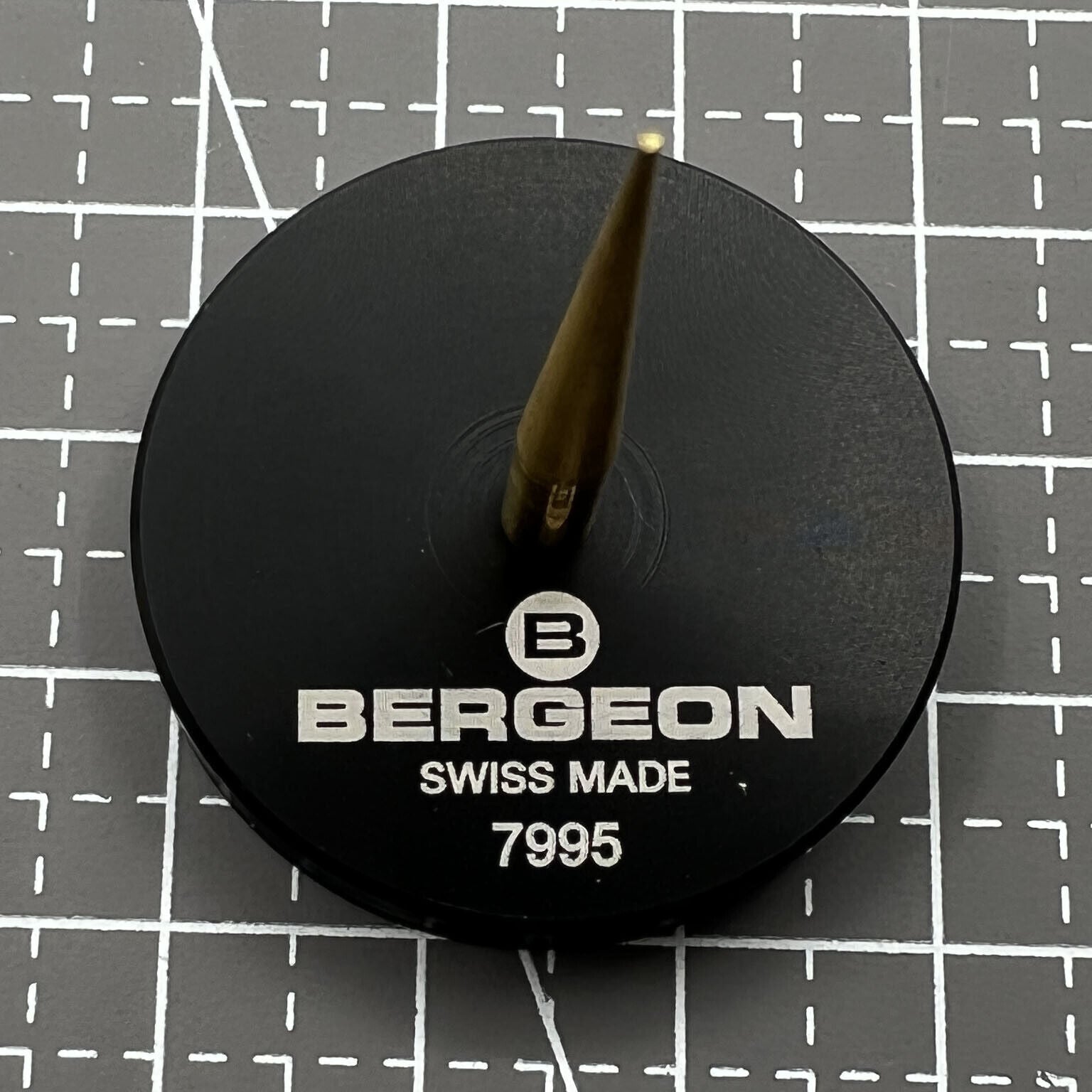 Swiss Bergeon 7995 balance cock support tool for precise watch repair and assembly tasks.