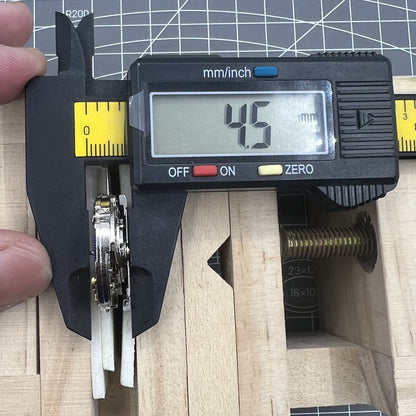 7120 Automatic Mechanical Watch featuring moon phase at 6 o'clock and visible bare balance wheel.