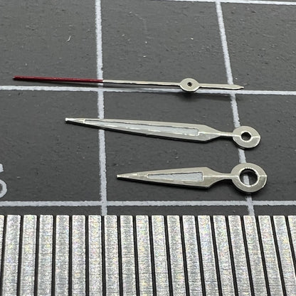 Luminous arrow-shaped watch hands by Miyota, perfect for enhancing visibility in low light conditions.