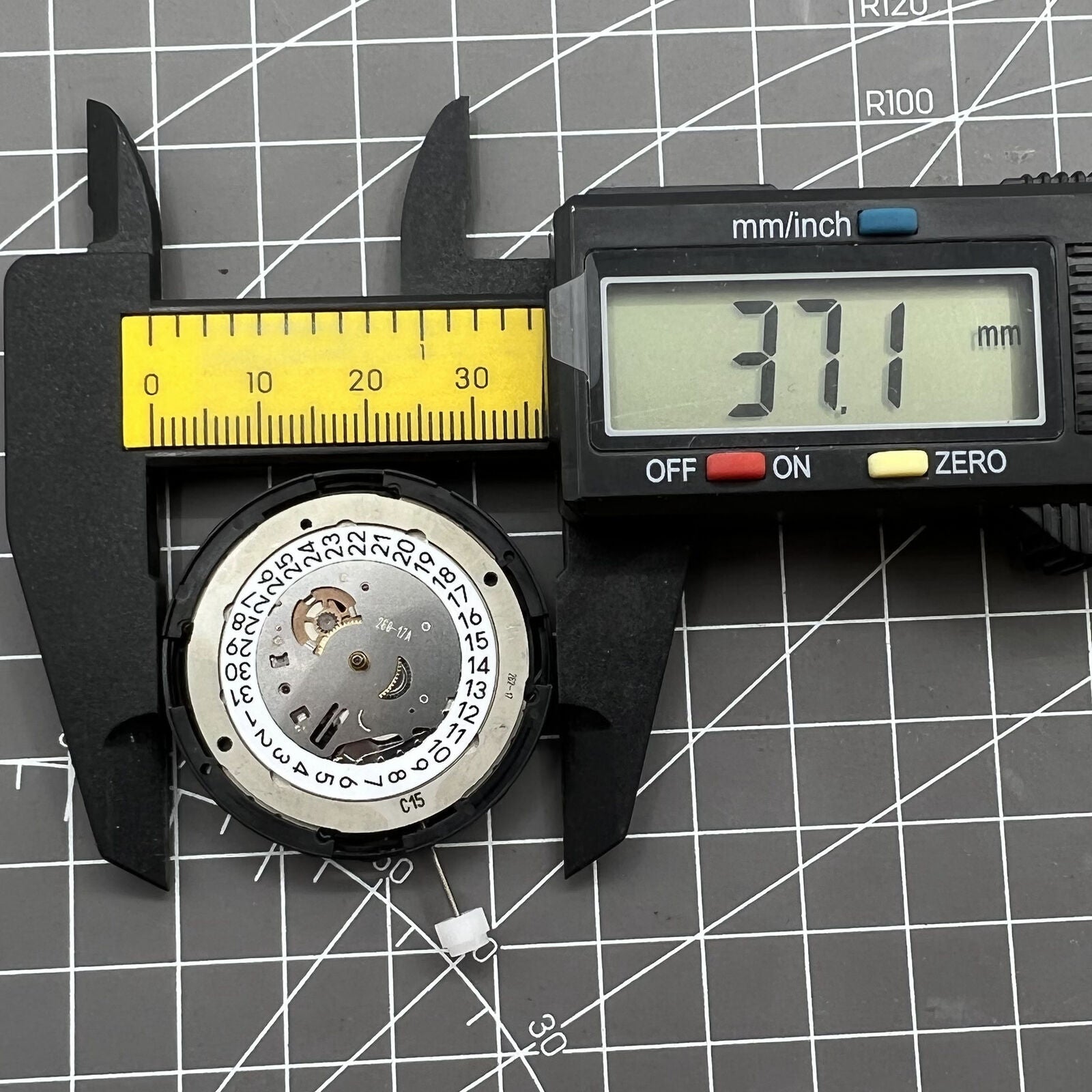 Tissot Swiss Made ETA C15.111 white dial chronograph watch movement for accurate timekeeping.