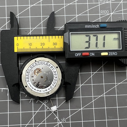 Tissot Swiss Made ETA C15.111 white dial chronograph watch movement for accurate timekeeping.