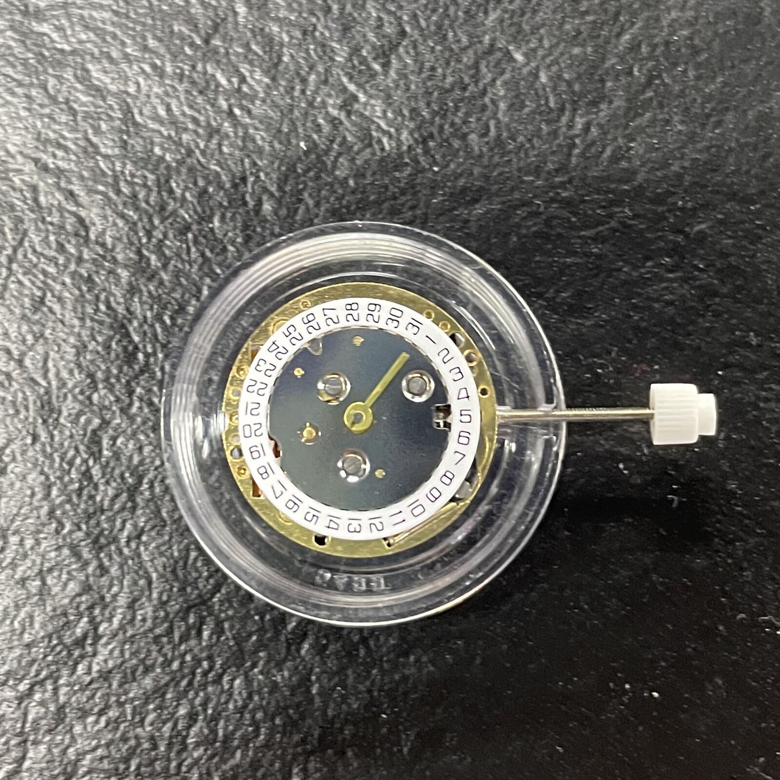 ISA 222 golden quartz movement for lady watch repair, precise and durable watchmaker part.