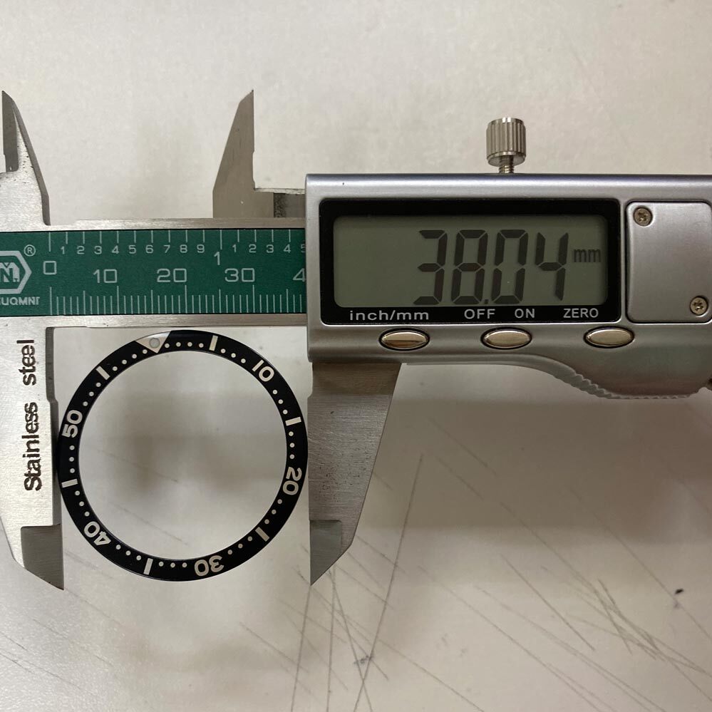 38 mm/31,5 mm blaue Ziffern-Uhrenlünetteneinlage aus Aluminium