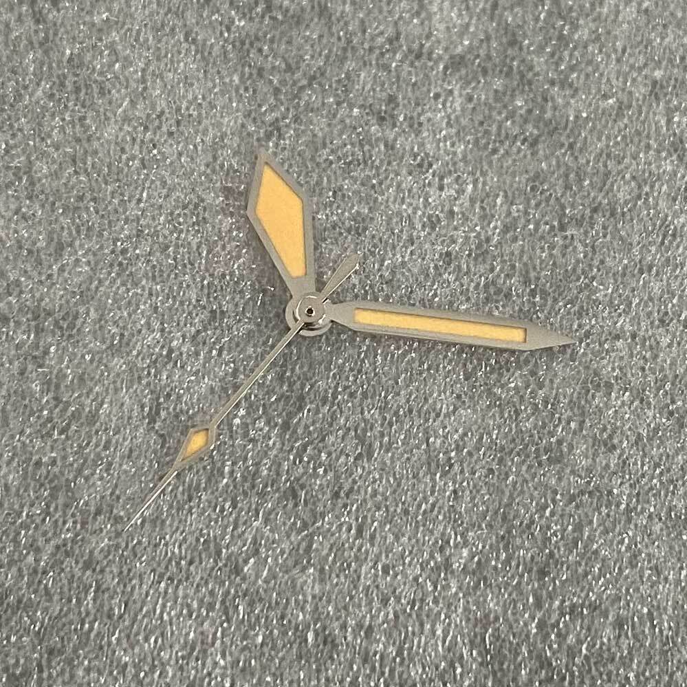 Vintage diamond-shaped watch hands with orange and green lume, silver trim for NH35/NH36.