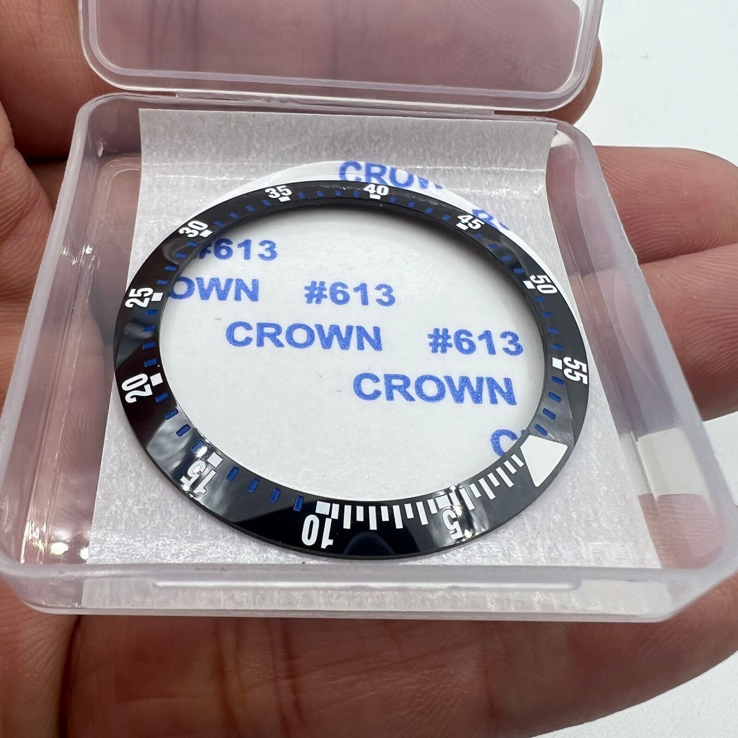 Black ceramic watch bezel insert 38mm with blue graduation, ideal for repairs and custom swaps.