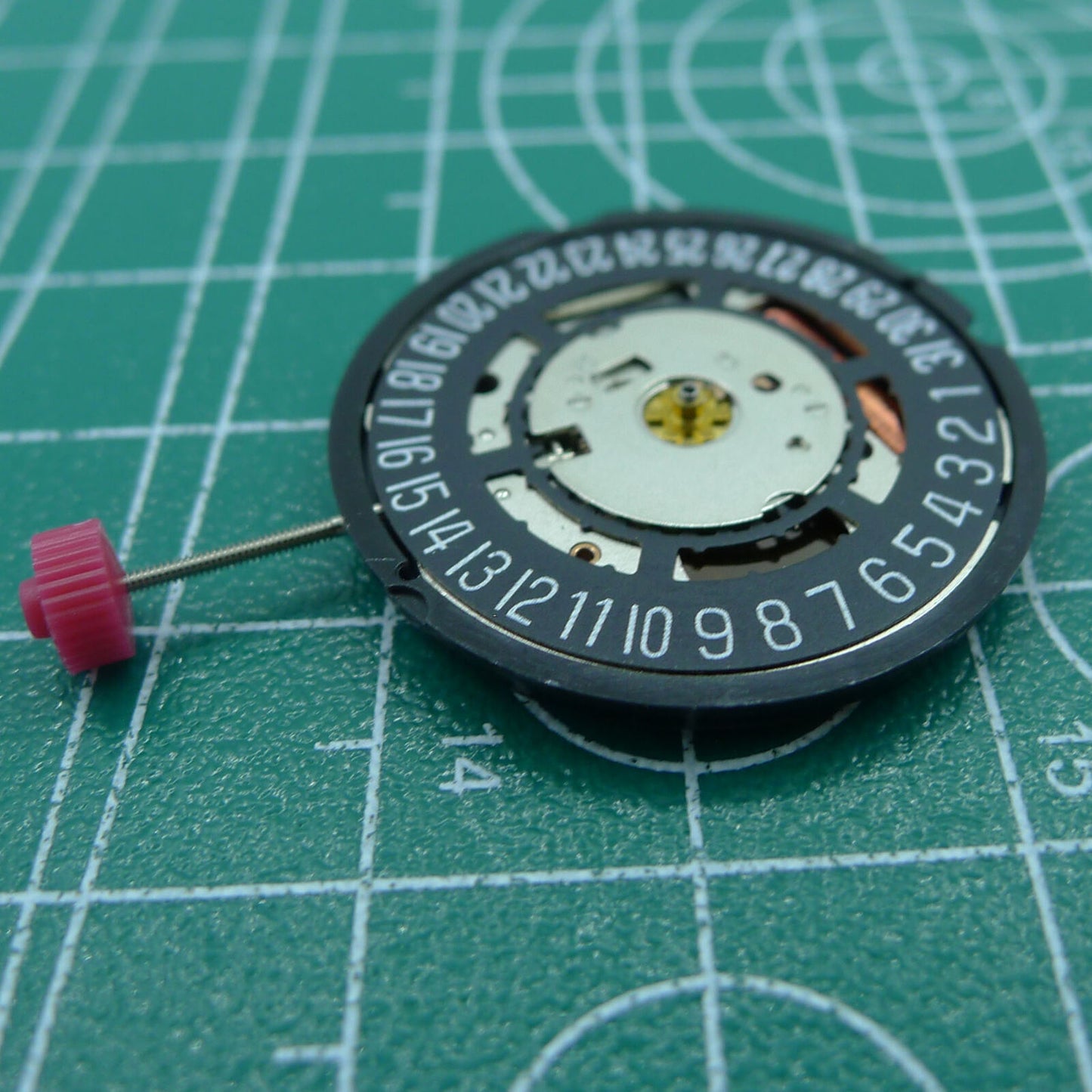 Swiss Part Ronda 715 quartz watch movement with black date wheel at 6 o'clock, replacement part.