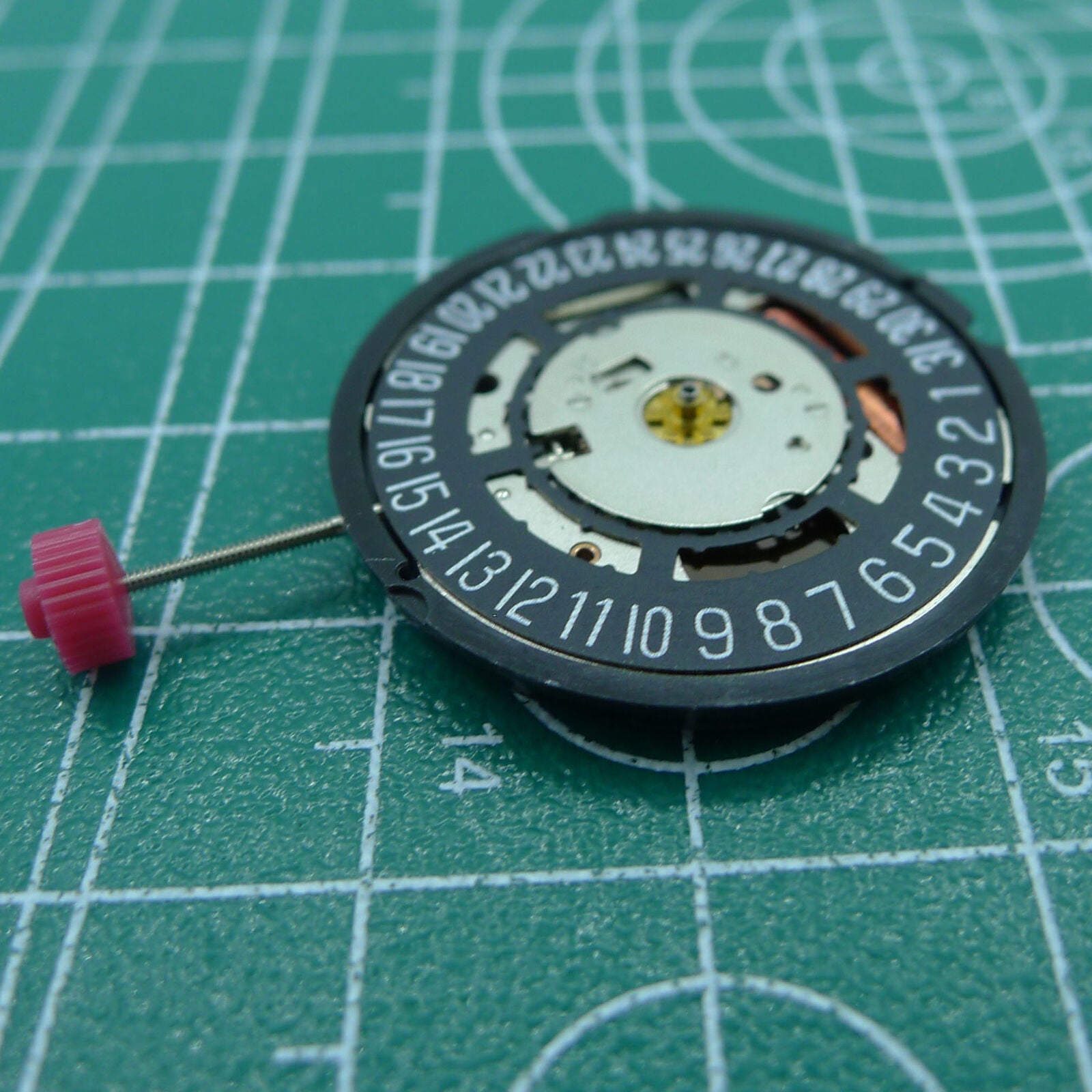 Swiss Part Ronda 715 quartz watch movement with black date wheel at 6 o'clock, replacement part.