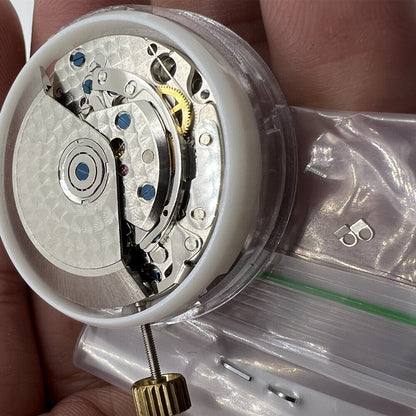 Asian 7750 chronograph watch movement by ETA with black dial, single calendar at 4:30, and seconds subdial at 9.