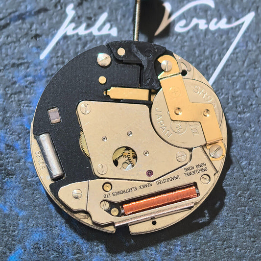 Swiss Made ETA 6640B quartz watch movement with black circuit board and three hands for precise timekeeping.