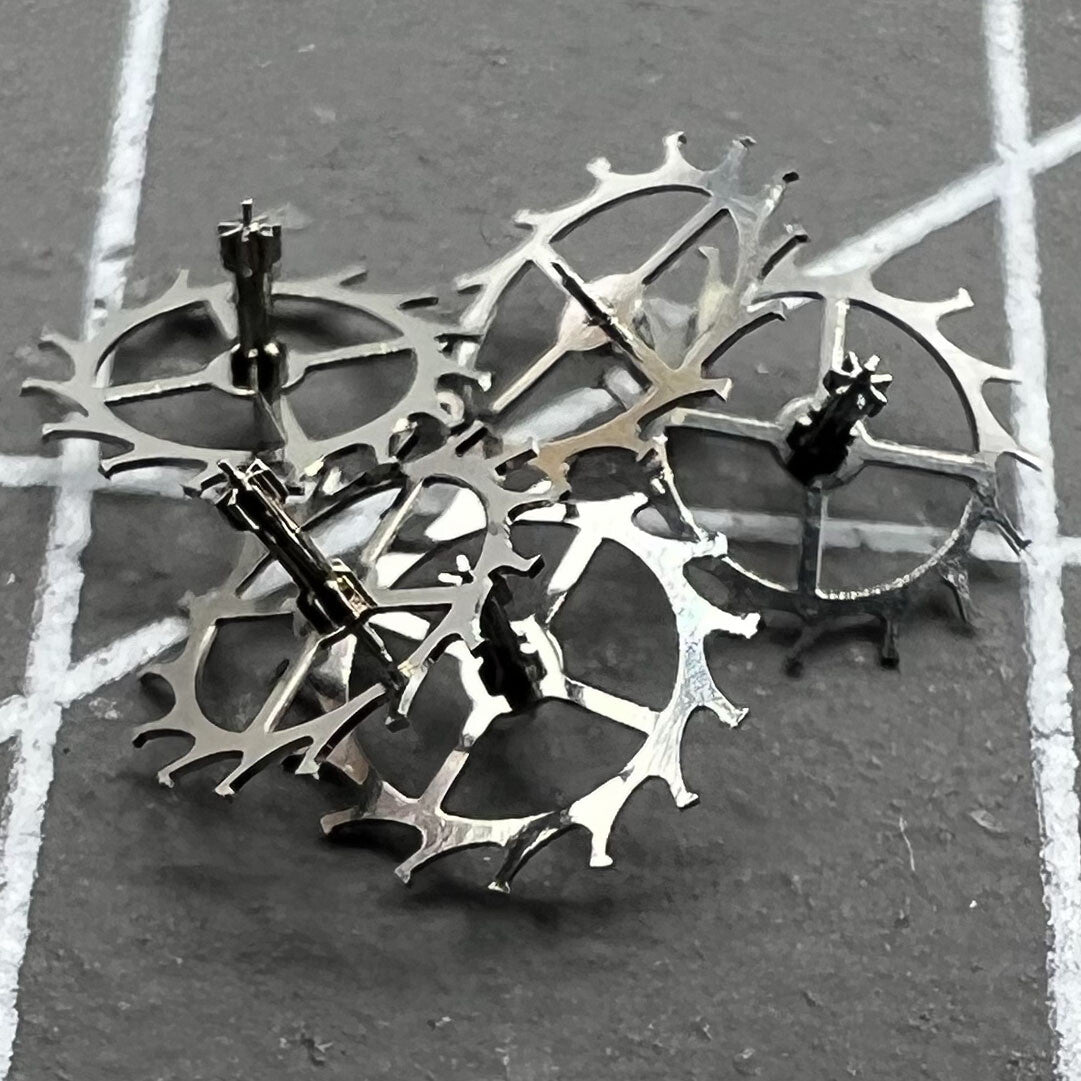 Precision Escape Wheel compatible with NH35 NH36 movement, ensuring accurate timekeeping.