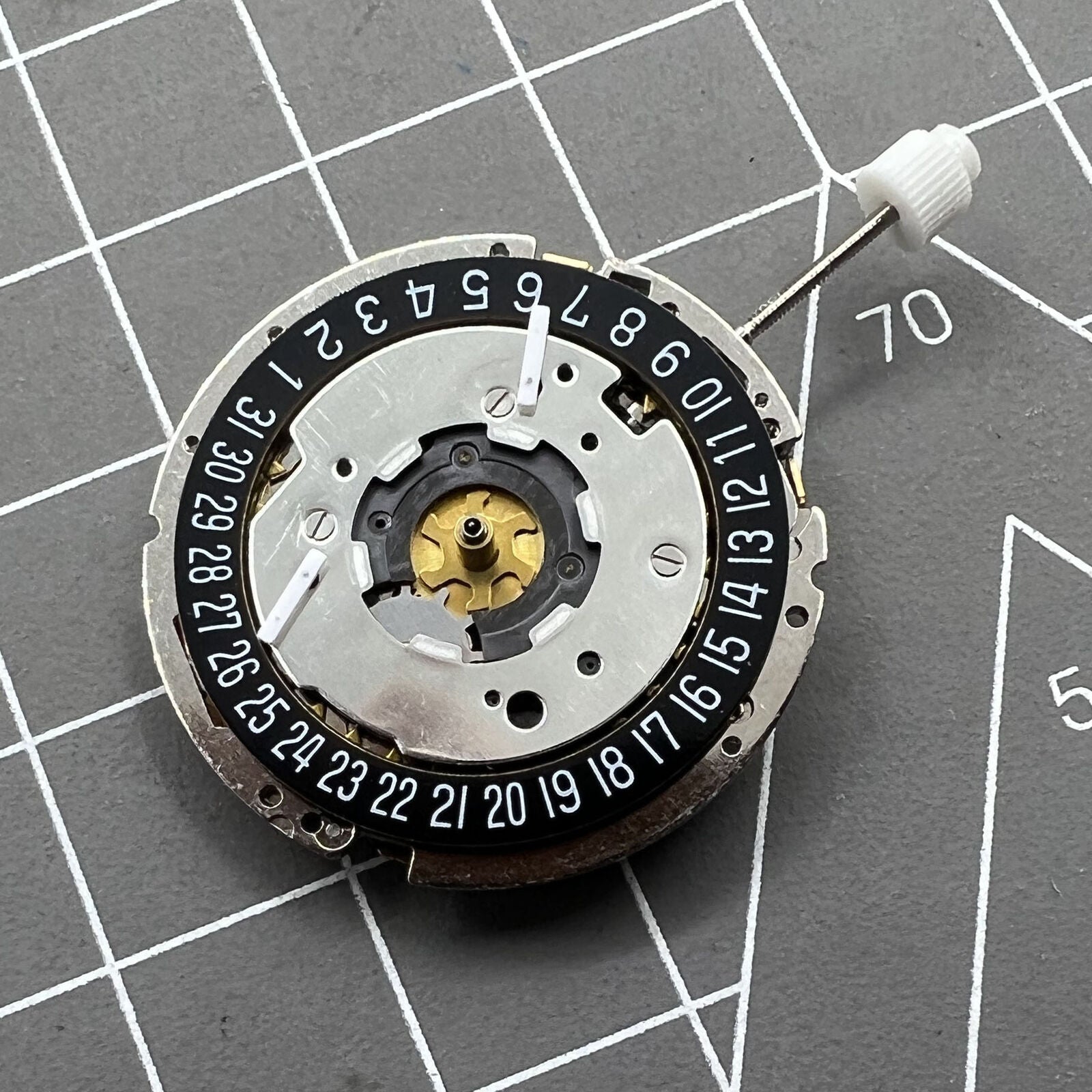 Golden ISA 8271 Date At 6 quartz watch with multifunctional dial, gold-tone stainless steel, elegant style.