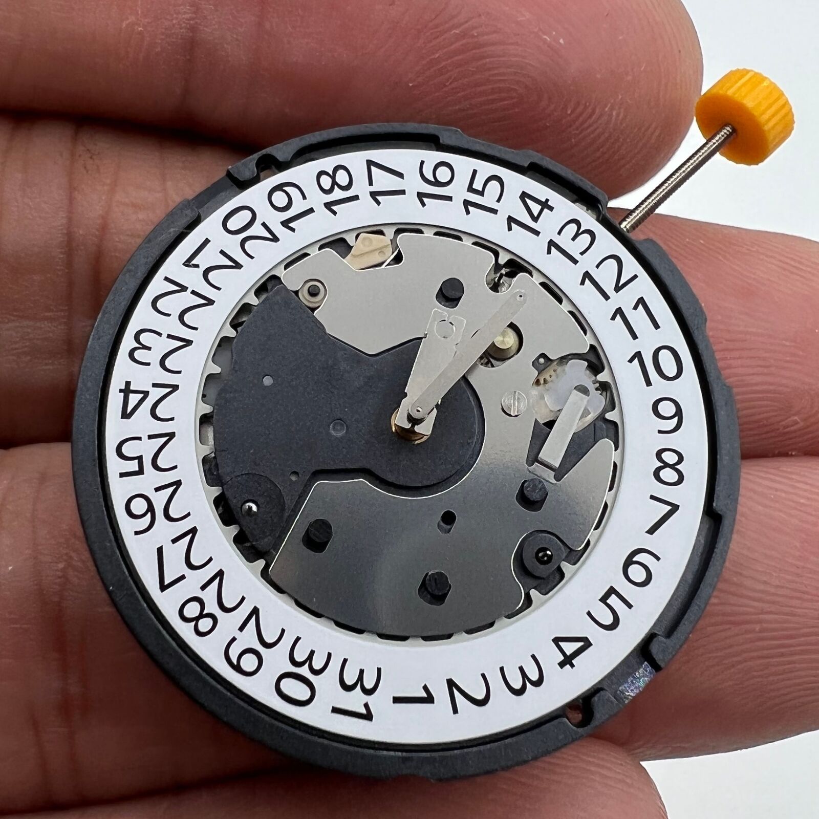Ronda Z60 Swiss quartz watch movement with small second hand at 6 o'clock, precision craftsmanship.
