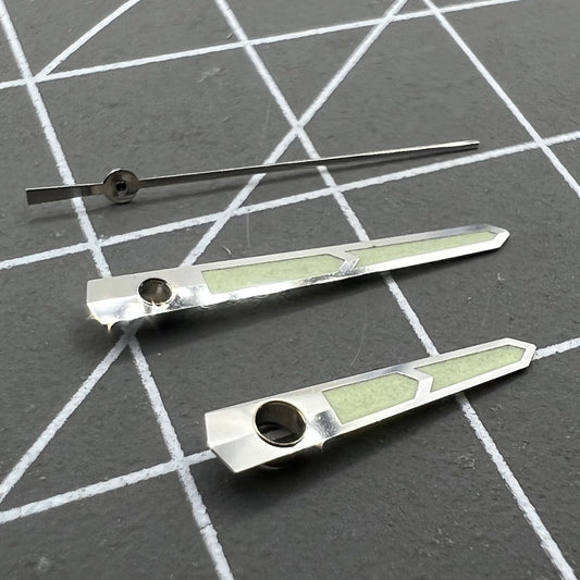 Green luminous watch hands designed for China Made 8215/2813/Miyota 8N24 movements, enhancing visibility.