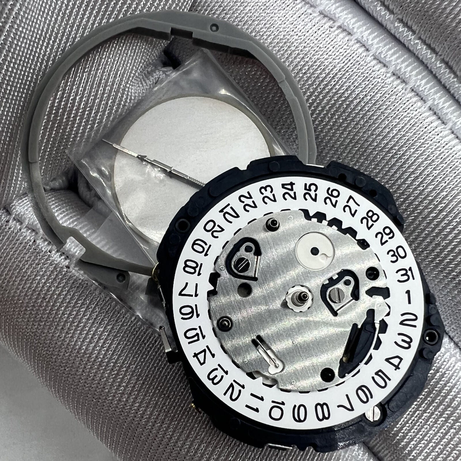 Hattori Epson TMI YM64A quartz watch movement, Japan made for precise timekeeping.