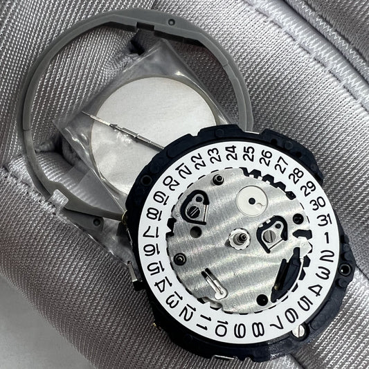 Hattori Epson TMI YM64A quartz watch movement, Japan made for precise timekeeping.