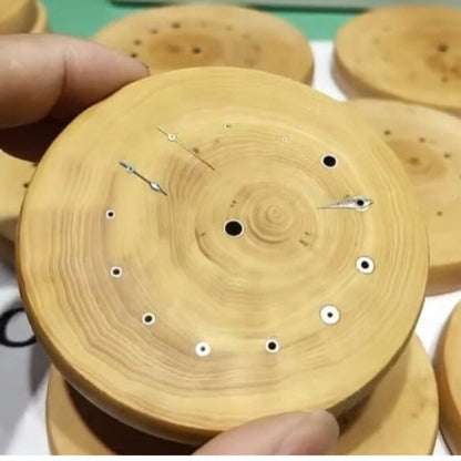 Boxwood watch hand wheels mount holder with copper tube for precise watch repairs, ideal for horology enthusiasts.