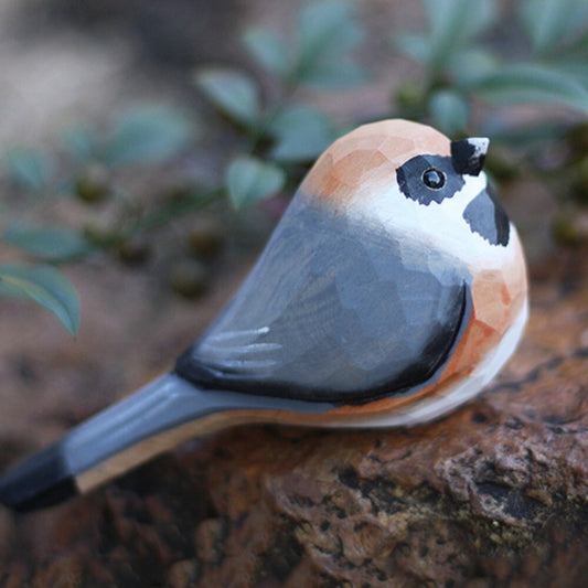 Handcrafted Aegithalos Concinnus wooden figurine, decorative bird sculpture for home decor.