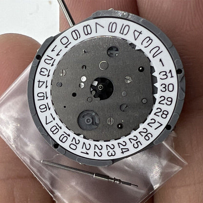 Japan-made Miyota FS21 chronograph watch movement with date display at 4 o'clock, precision quartz mechanism.