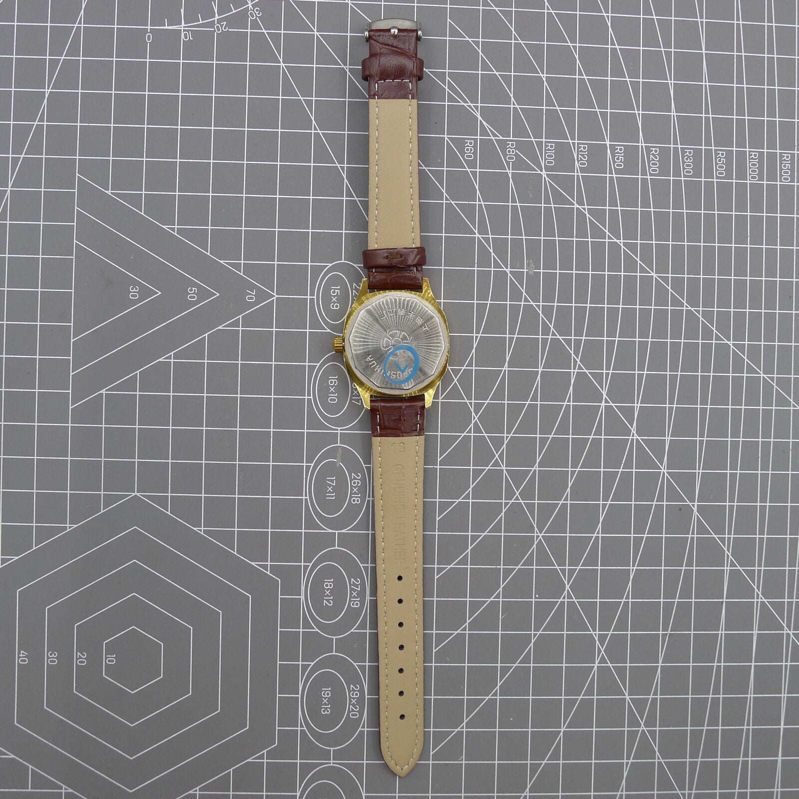 33mm Shanghai watch with blue dial, golden nail markers, square case, manual movement by Shanghai brand.