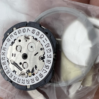 Hattori Epson YM26A quartz watch movement showcasing precise Japanese craftsmanship and durable design.