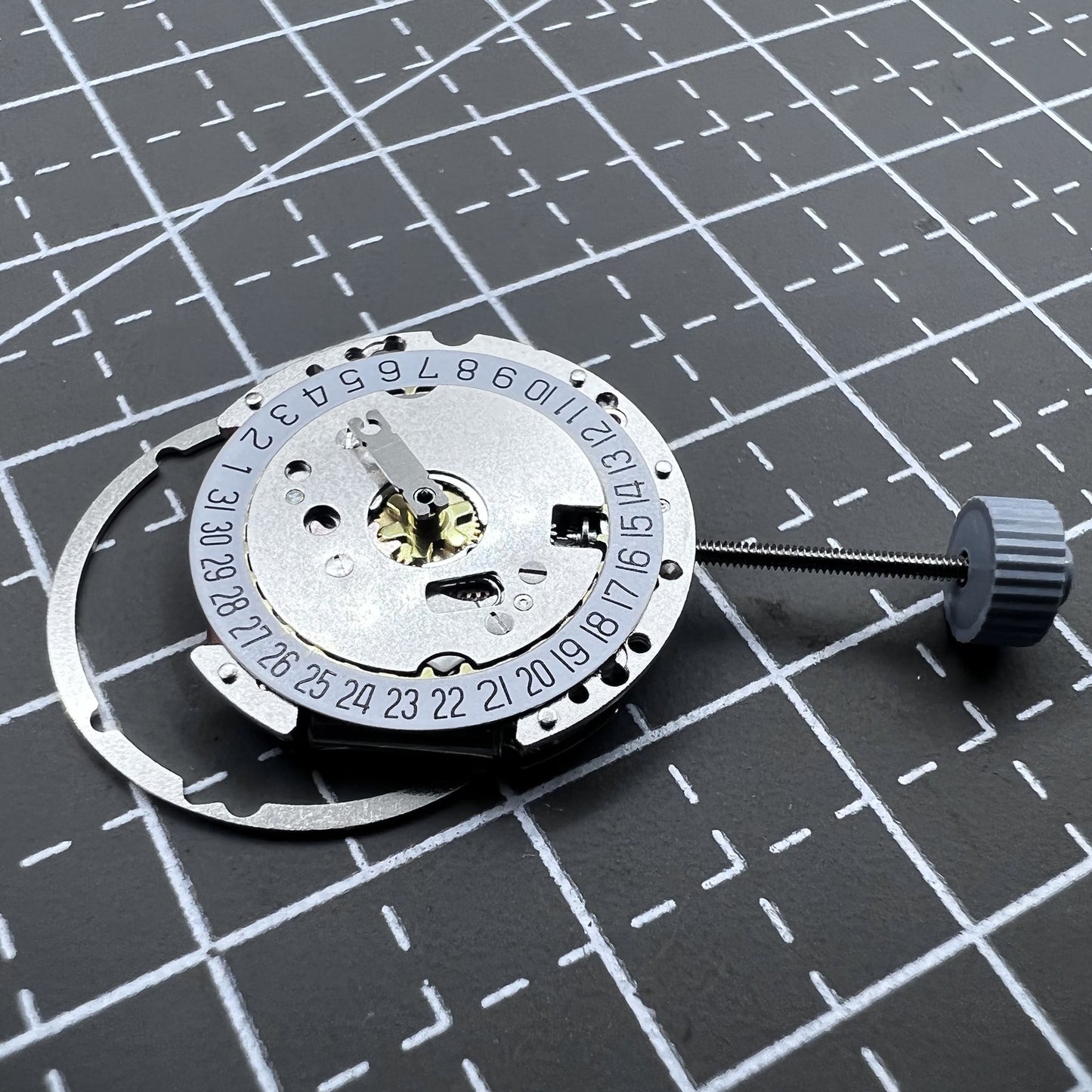 Swiss Quartz watch movement Ronda 775 with date at six o'clock, precise timekeeping by Ronda brand.