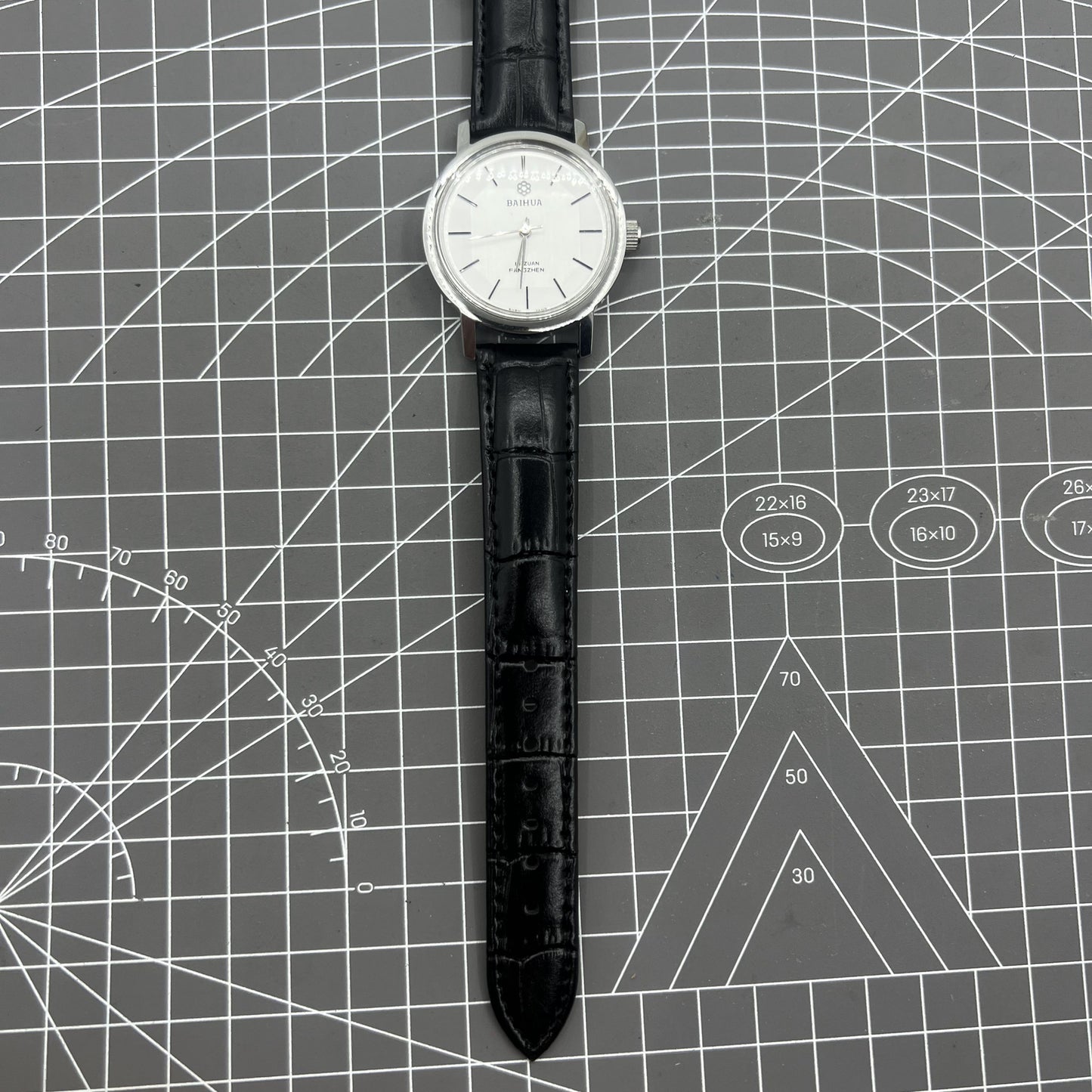 37mm China Baihua manual watch with 19 jewels, silver dial, shock-resistant for durable style.