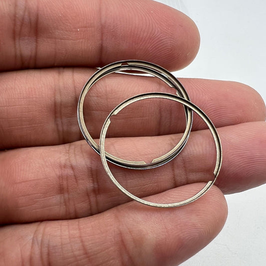 Steel watch case movement cushion mount spacer ring for ETA 2824 ETA 2836, precision fit accessory for watch repairs.
