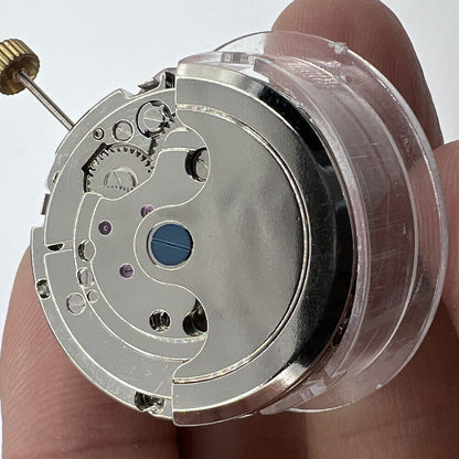 China Made Perpetual Calendar watch accessory highlighting mechanical movement with hollow balance wheel at 6 o'clock.