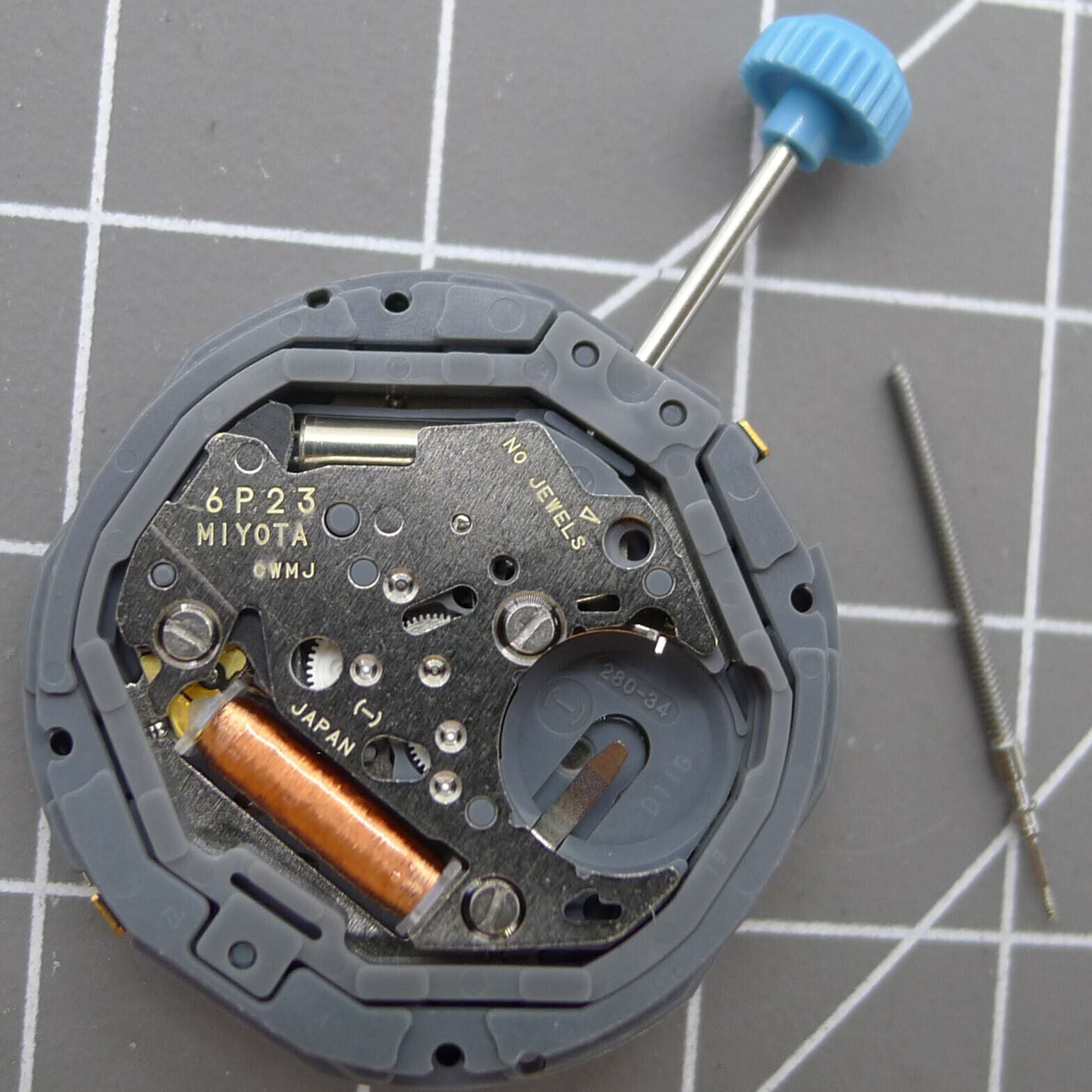 Japan Miyota 6P23 quartz watch movement with 5 hands, precision-engineered for durable timekeeping.