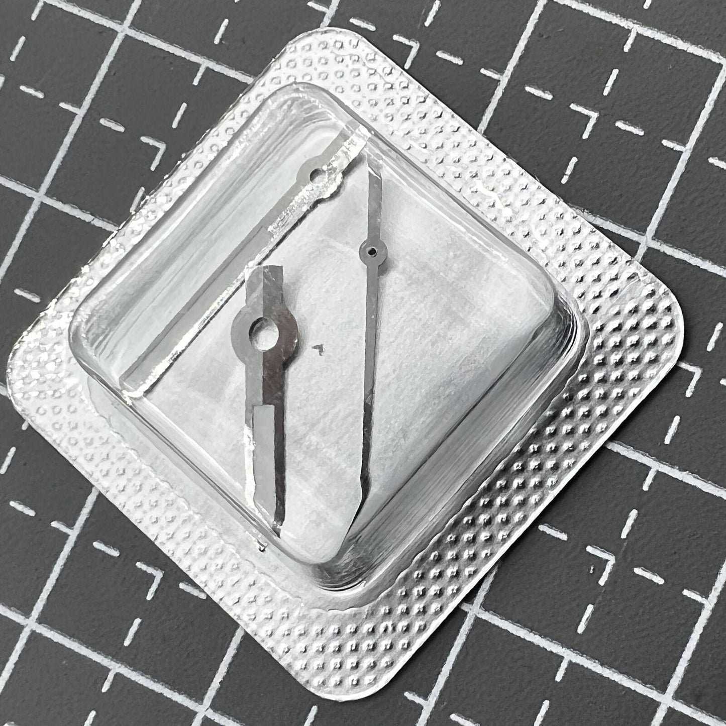 Set of 16mm black watch hands with silver trim by M005.4, compatible with ETA2836 movements.