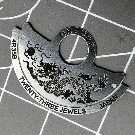 Dragon-themed silver rotor overlay for NH35 NH36 4R35 watch movements by Dragon~China, enhancing watch aesthetics.
