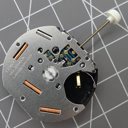 LD57 quartz watch repair part with small second subdial at 6, 9, and 12 o'clock for precise timing.