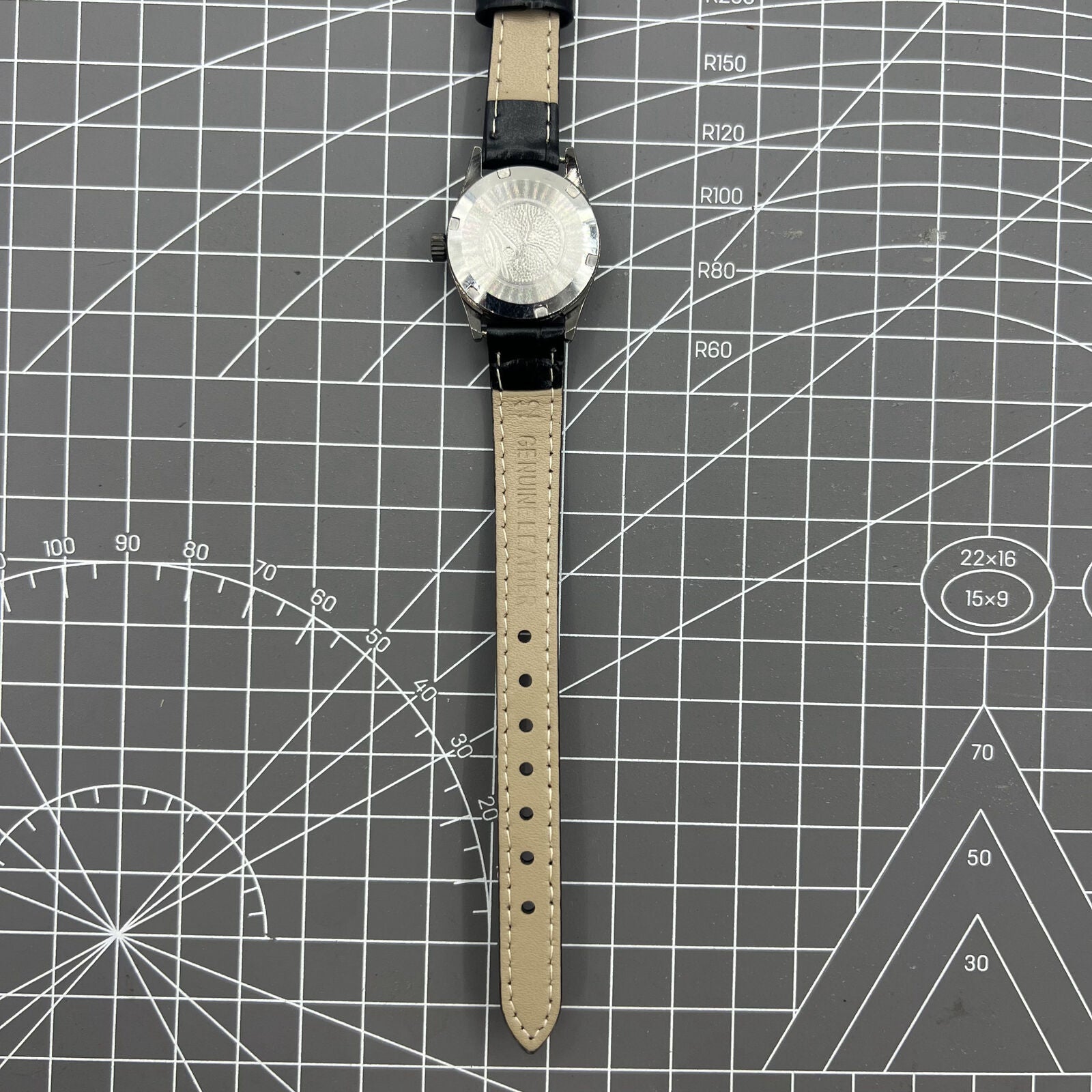 Seagull black ladies watch with gold nail markers, manual mechanical movement, and shock resistance.