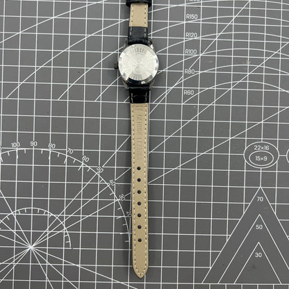 Seagull black ladies watch with gold nail markers, manual mechanical movement, and shock resistance.