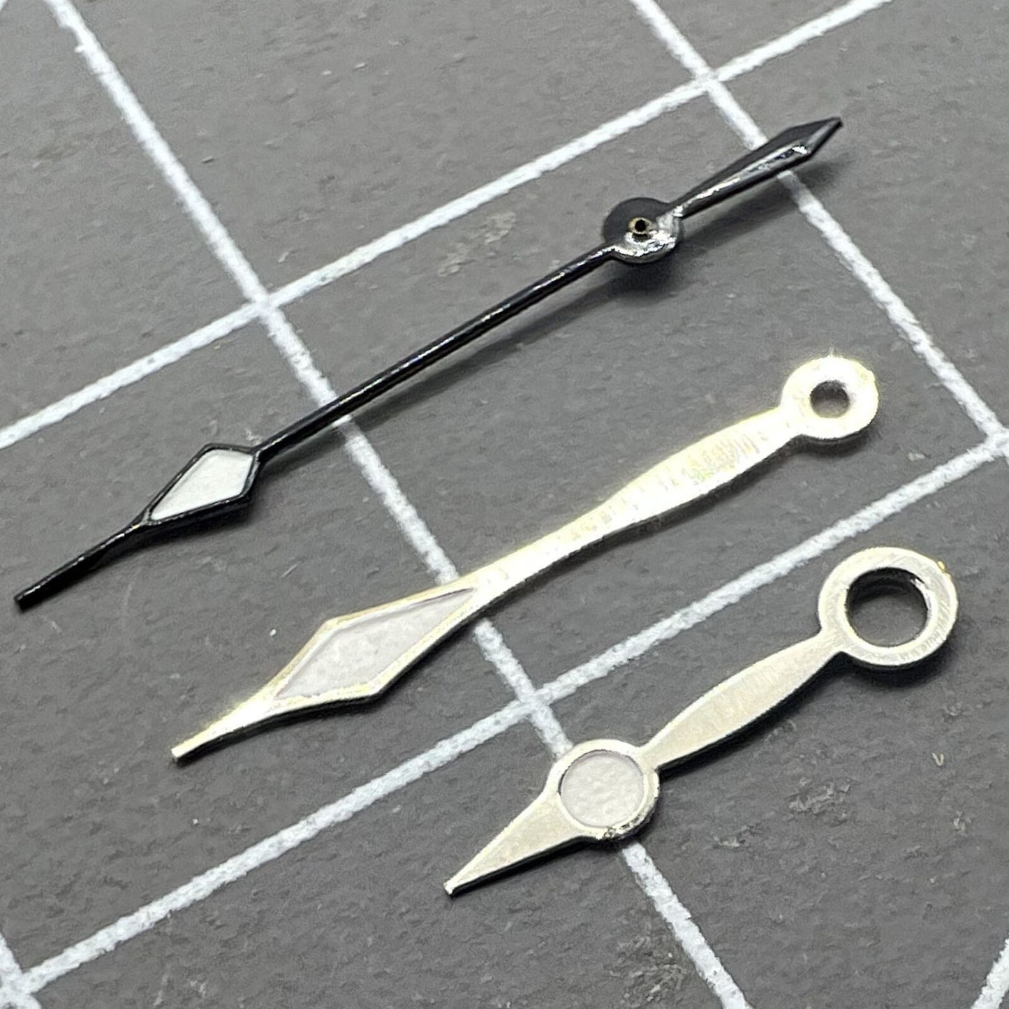 LUME black second hand for Miyota 2035 quartz watch movement, precise replacement part.