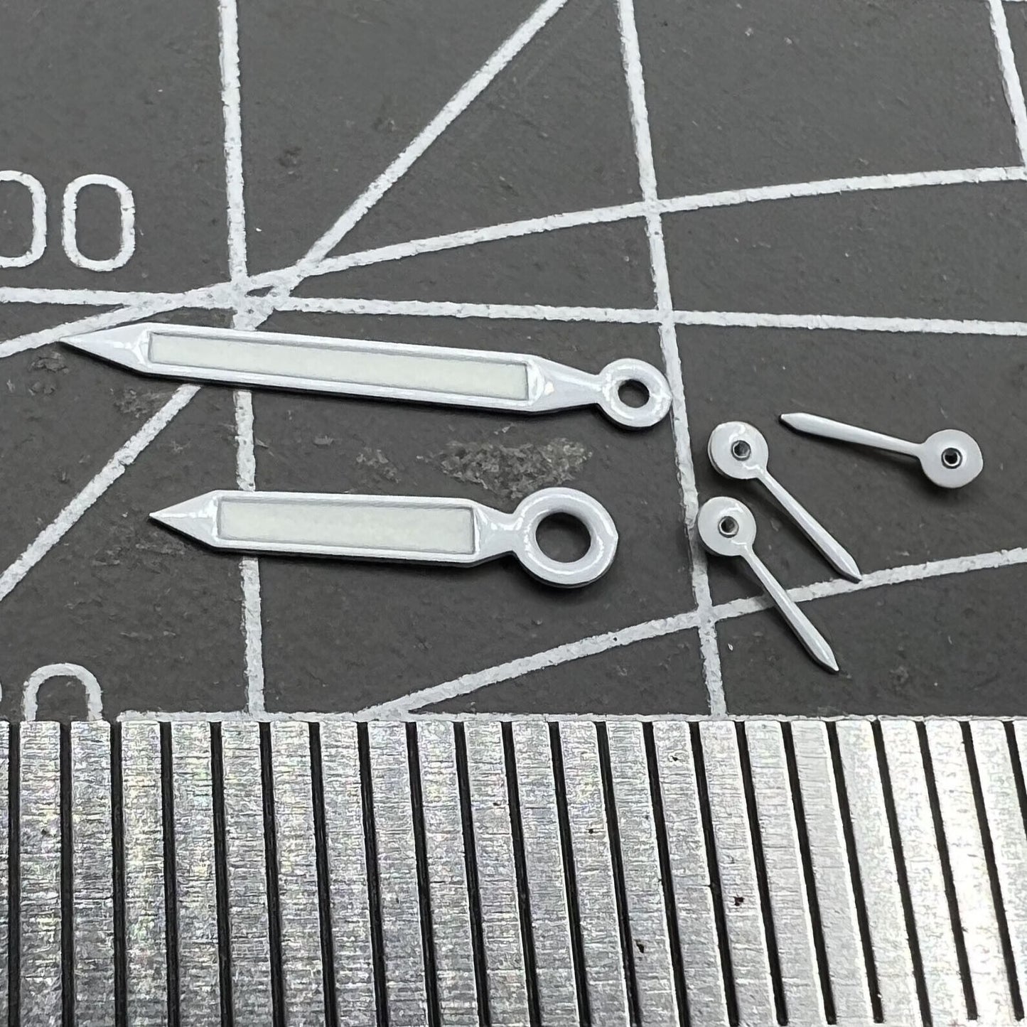 White trim green lume watch hands for Miyota OS20 movement, enhancing legibility and style.