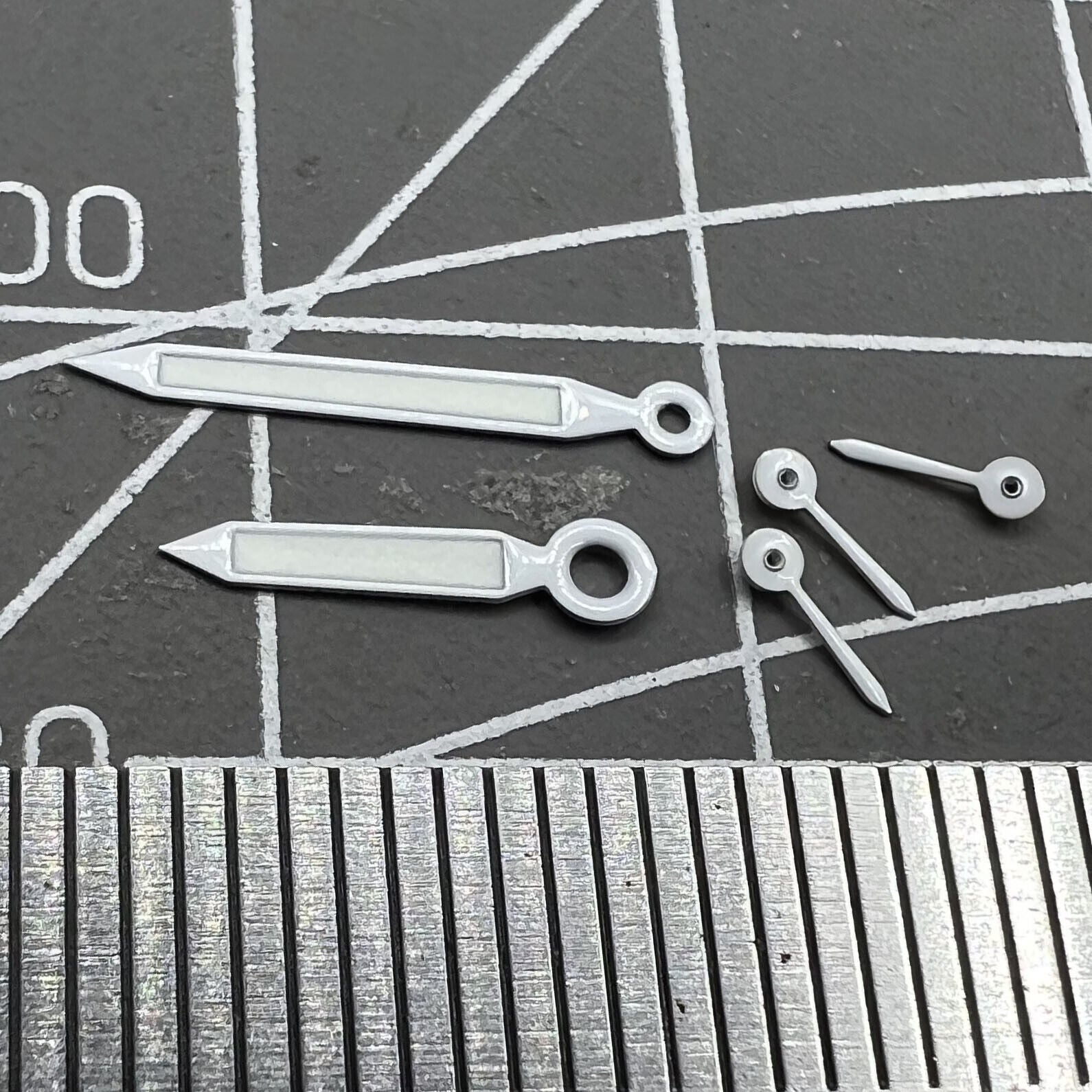 White trim green lume watch hands for Miyota OS20 movement, enhancing legibility and style.