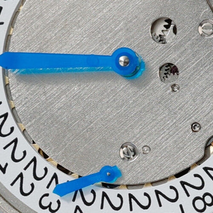 Hangzhou 8220A automatic watch movement showcasing precise mechanical inner workings with small second at 9 position.