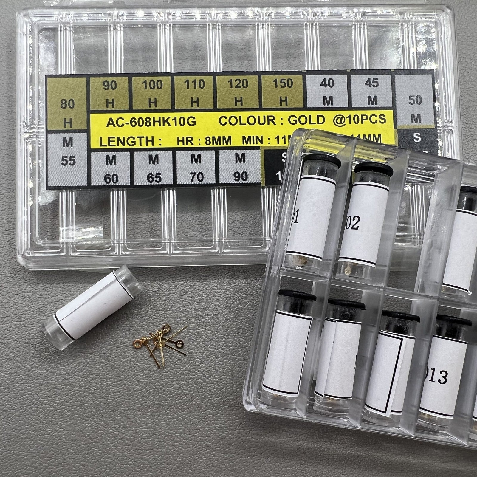 Golden watch hands set, 18 sizes for hour, minute, second, ideal for precise watch repairs.