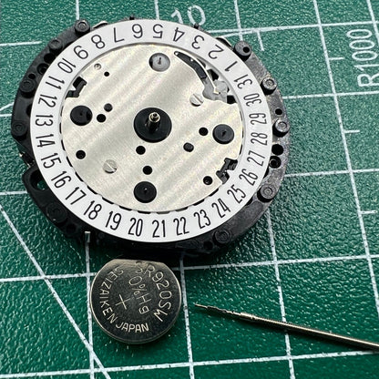 Hattori Epson TMI VD53C quartz watch movement with date display at 6 o'clock for accessories.